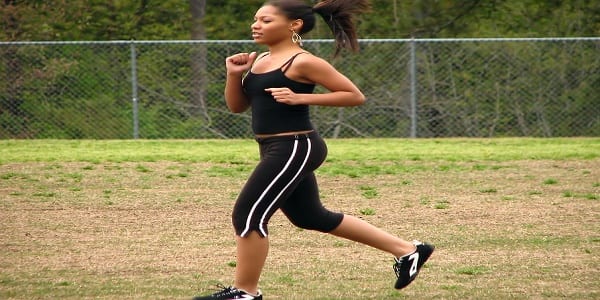 5166-a-beautiful-teen-african-american-girl-running-by-a-fence-pv