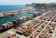 Aerial view of a busy African container port with cargo ships