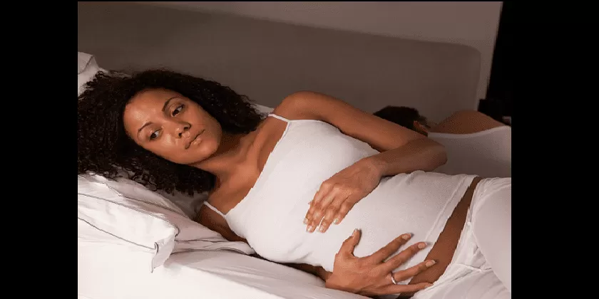 pregnant-woman-in-bed