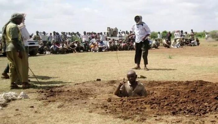 terroriste-etat-islamique-aqmi-mujao-lapidé-pierre