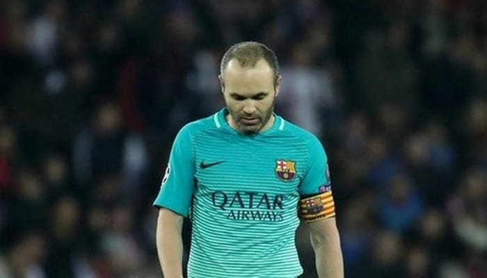 Barcelona’s Andres Iniesta looks dejected