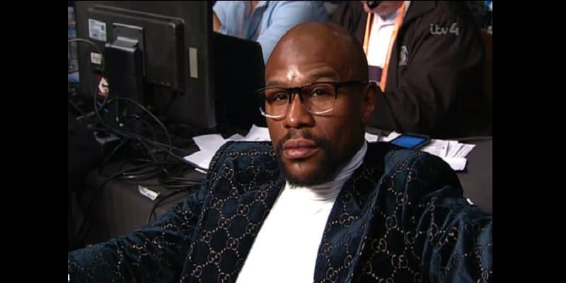 8752532-6615027-Mayweather_watched_from_ringside_as_Pacquiao_called_him_out_to_a-a-11_1548070497980