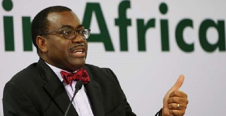 AfDB President Adesina gestures as he addresses a news conference on the first day of the annual meeting of AfDB in Gandhinagar