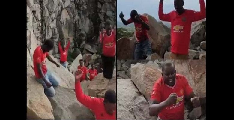 Man-United-fans-seen-praying-on-the-mountain-ahead-of-their-victory-Video-lailasnews