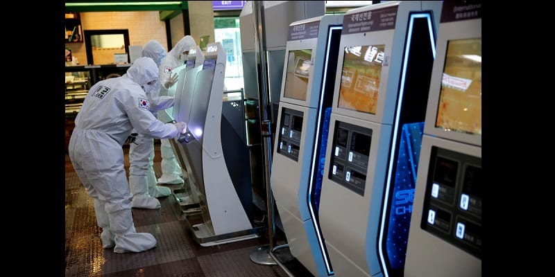 South Korean clean self check-in machines after spraying disinfectant at the international airport amid the rise in confirmed cases of coronavirus disease (COVID-19) in Daegu