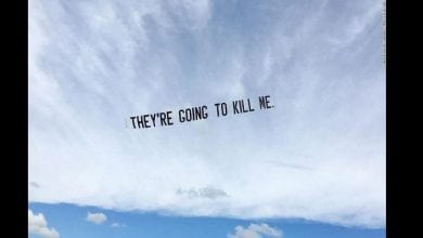 200602145831-06-jammie-holmes-george-floyd-banners-crop-super-tease