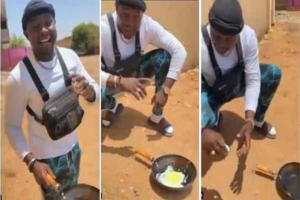 Man-fries-egg-with-direct-heat-from-sun-in-Sudan