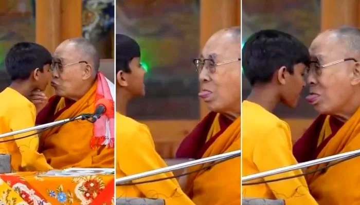 Le Dalai Lama embrasse un enfant