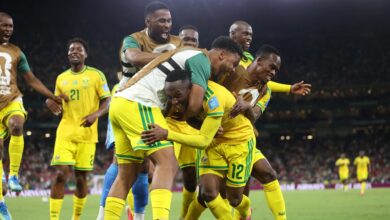 Des joueurs sud-africains célèbrent un but contre la Corée du Sud