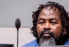 Mahamat Said assis dans une salle de la Cour pénale internationale